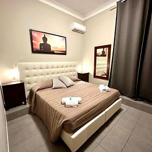 Kamer met een Queen Size Bed